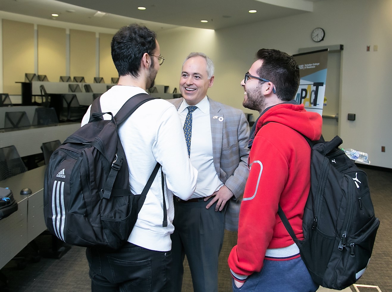 President Cabrera talks to students after his presentation