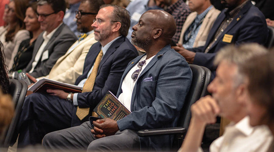 Audience member with Amy Webb's book "The Big Nine"
