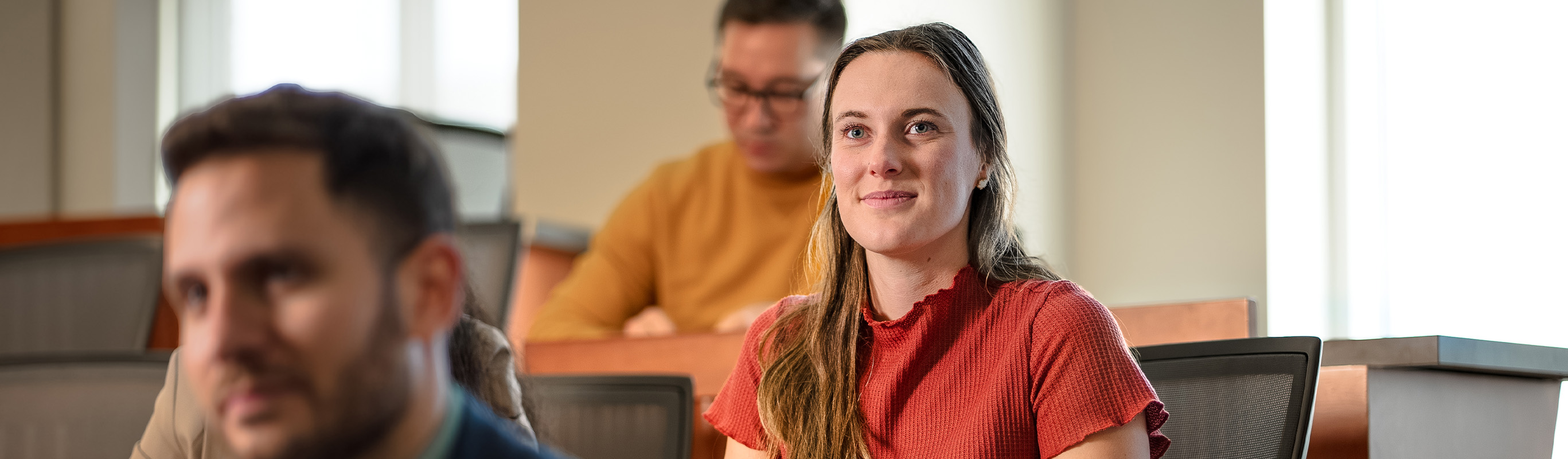 Scheller graduate students sit in a classroom