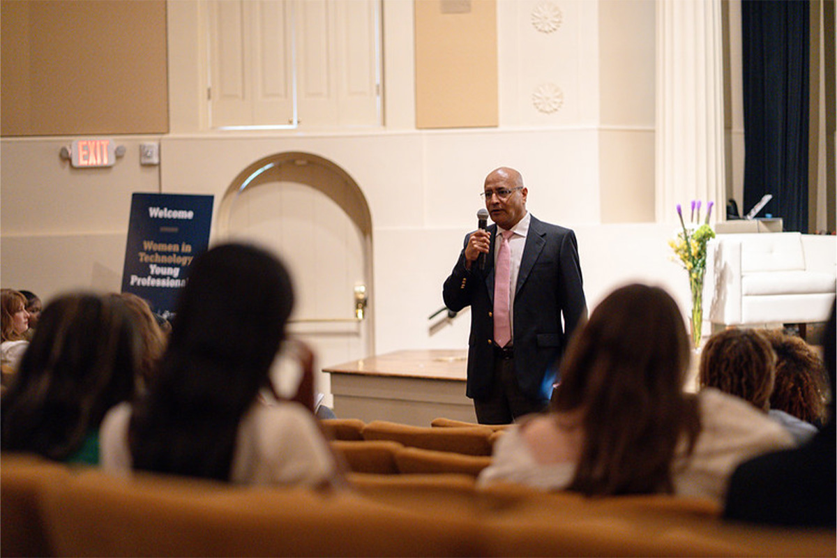 Dean Anuj Mehrotra welcomes attendees, which include WIT YoPros and Scheller faculty, students, and staff