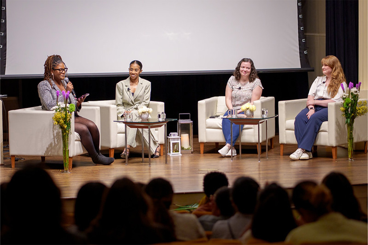 (From left) Analisa Wade, MBA '25, moderates a discussion with Brooke Shareé, MBA '25,  Rachel Wiseley, MBA and M.S. '18, and Elizabeth Baker, MBA '24