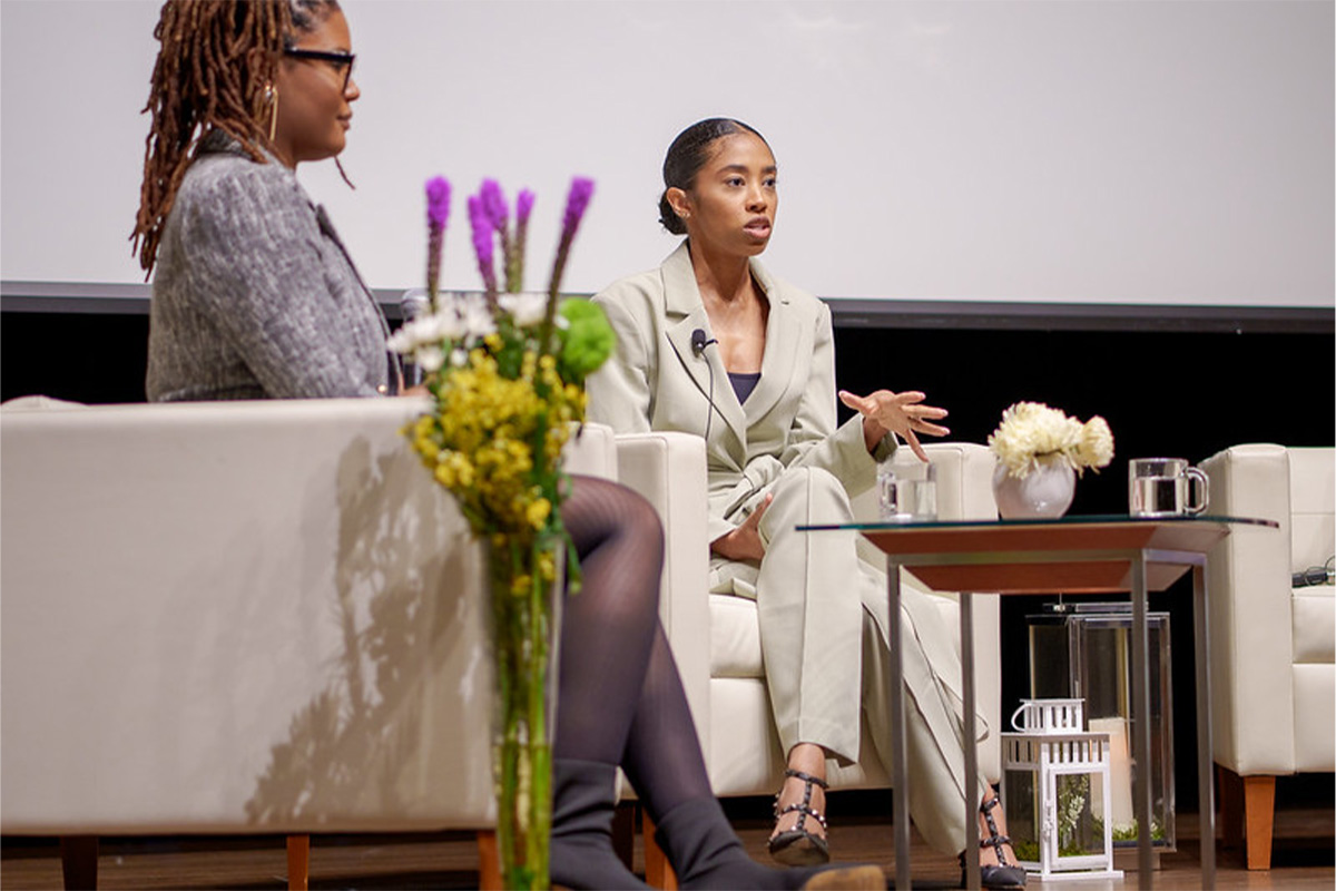 Analisa Wade (from left), Full-time MBA '25, moderates a discussion with three panelists, including Brooke Shareé, Full-time MBA '25