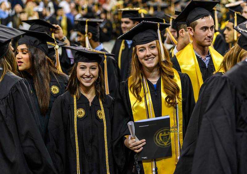 Undergraduate business students celebrate commencement.
