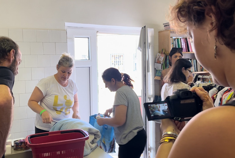 Filming at the charity shop. 