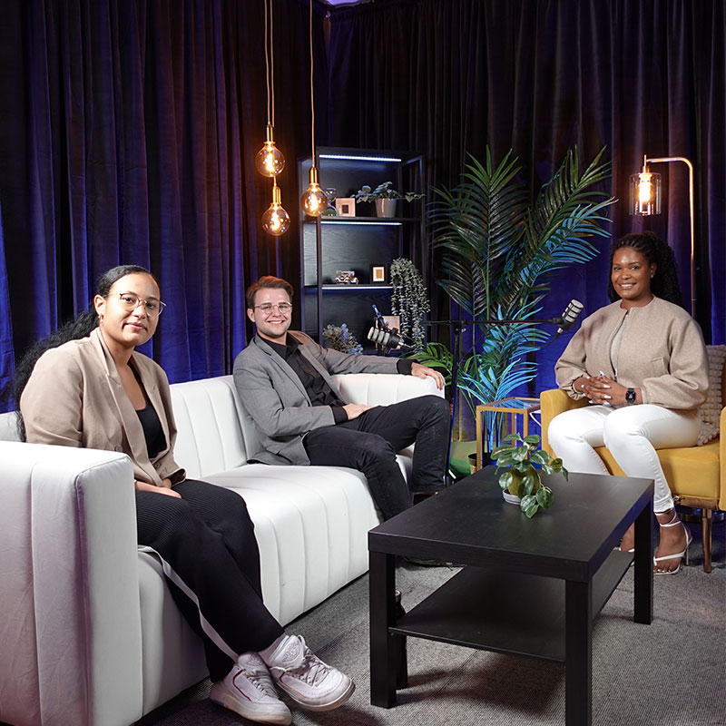 Leah Cabrera, MBA ‘24; Wyatt Williams, MS ‘25 and MBA ’24; and Analisa Wade, MBA ‘25 sitting down to record a podcast