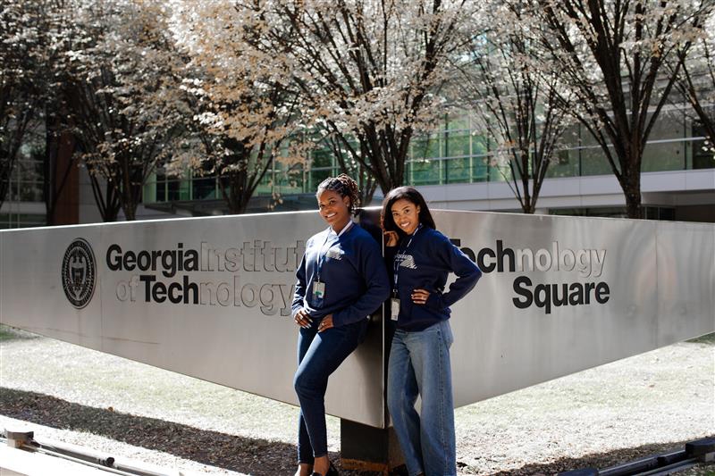 Brooke and Analisa stand at Scheller's Intersection