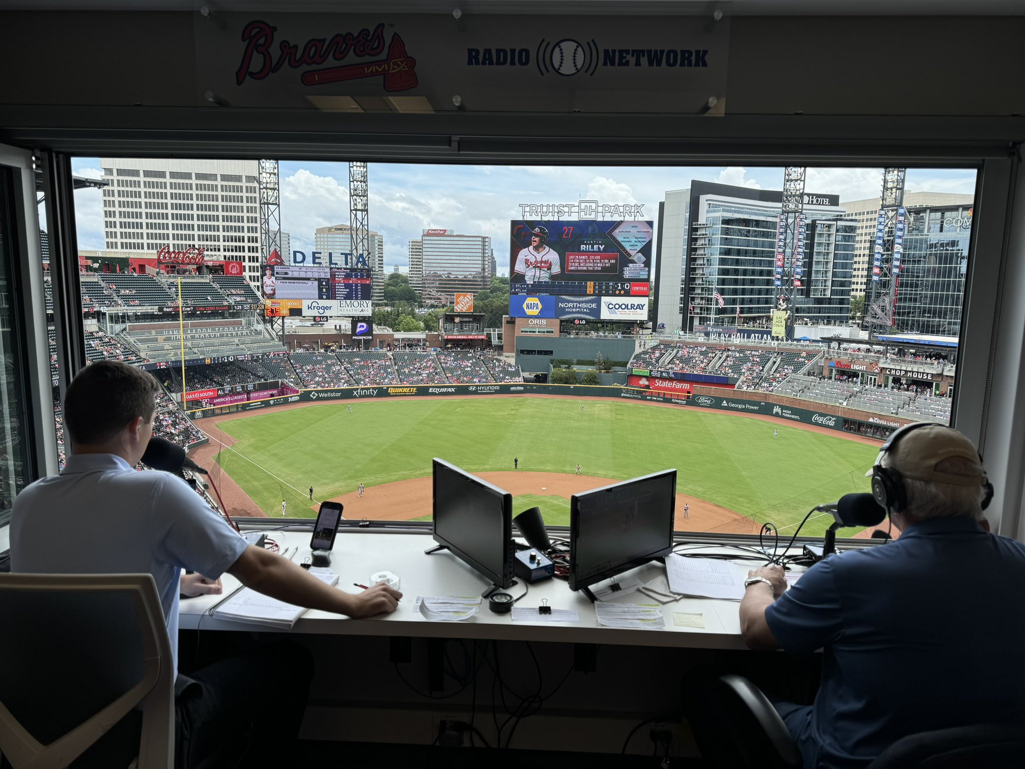 Wiley in the press box at an Atlanta Braves game at Truist Park.