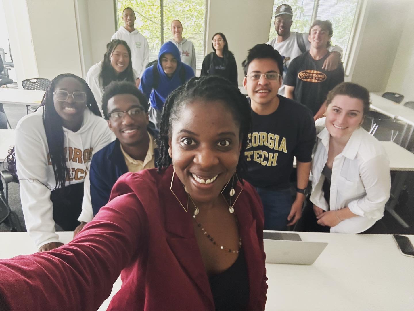 Tiffany D. Johnson takes a selfie with students in her Work, Equity, and Wellness class. 