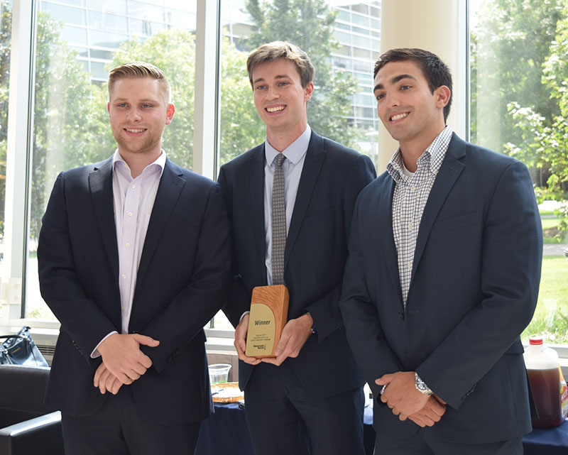 The winning team! SunTrust Team: Will Courreges-Clercq, Business Administration; Alex Ketchum, Industrial Engineering;  Sam Rubin, Business Administration; not pictured: Nicholas Rogstad, Industrial Engineering;  Anjani Agrawal, Industrial Engineering; and Mario Wijaya, M.S. Analytics.