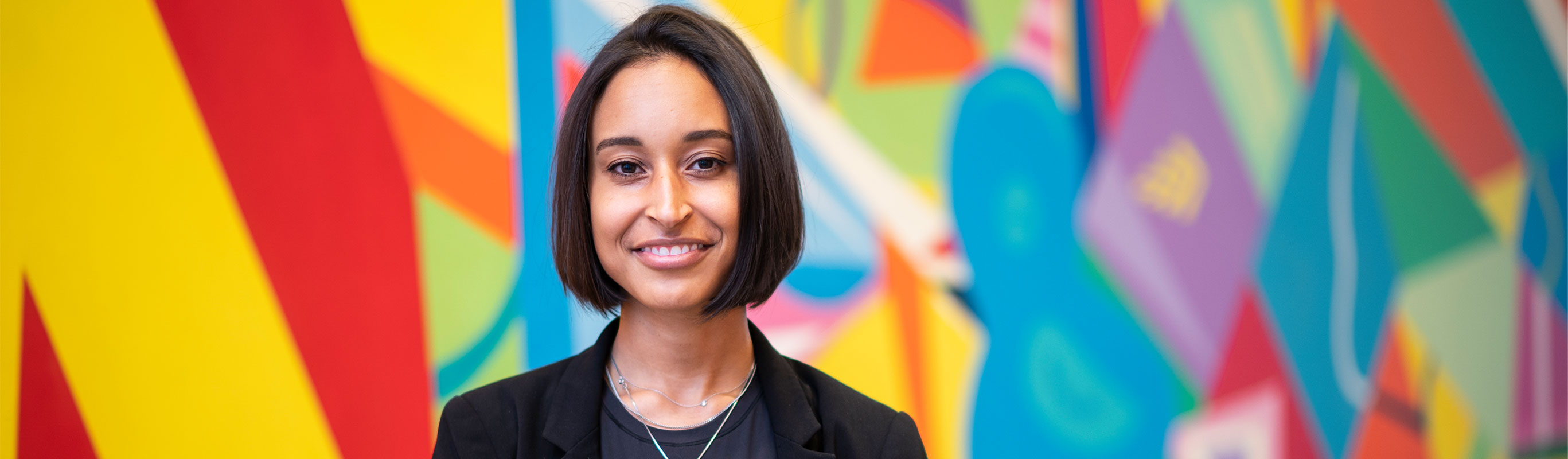 A young women with colorful background